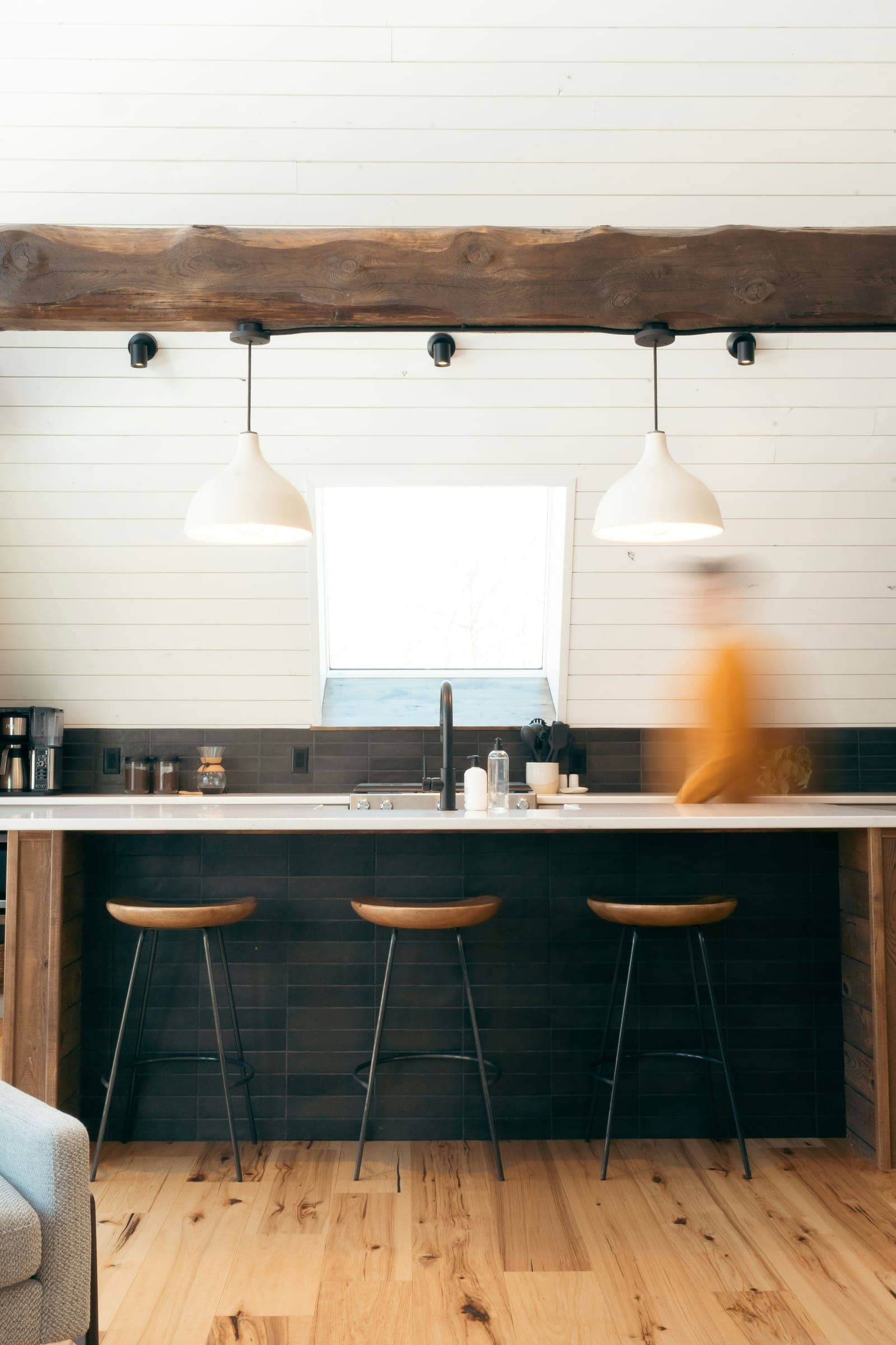 Kitchen with pendant lights and a breakfast bar